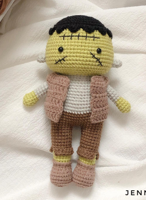 Crocheted Frankenstein character doll, highlighting its unique and captivating design.