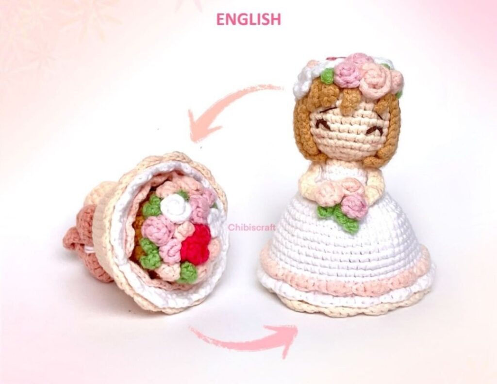 Crochet doll holding a flower, featuring a handmade design and reversible style.