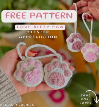 Crocheted cat paws in white and pink, with a loving design, perfect for cat lovers and crafters.